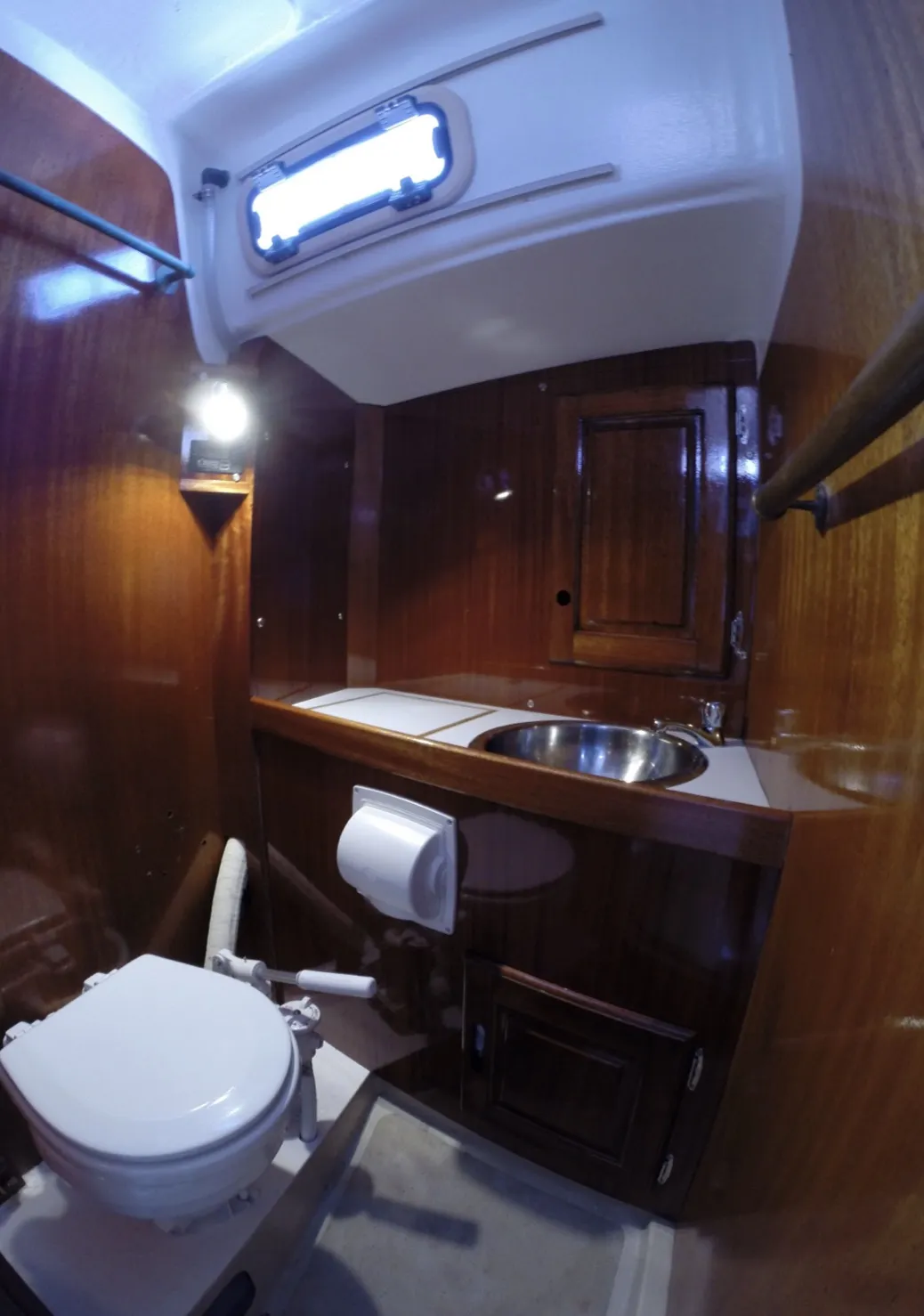 Finished head with tank and plumbing hidden behind removable panels. Out of sight, but never out of mind. (Photo/ Tom Egan)